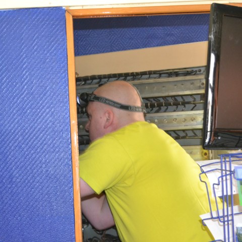 a man sitting in front of a computer