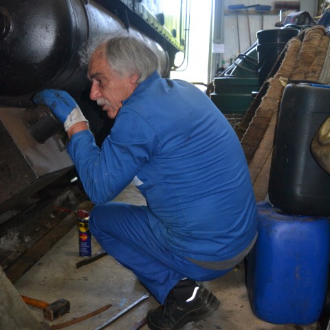 a man cooking in a kitchen