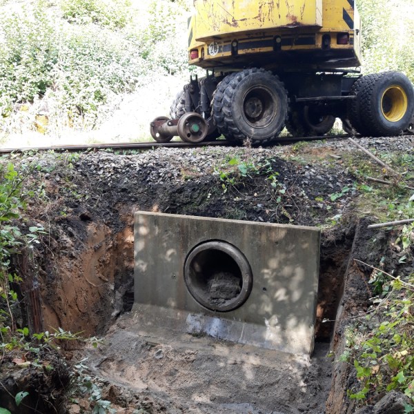 a truck that is sitting on a rock