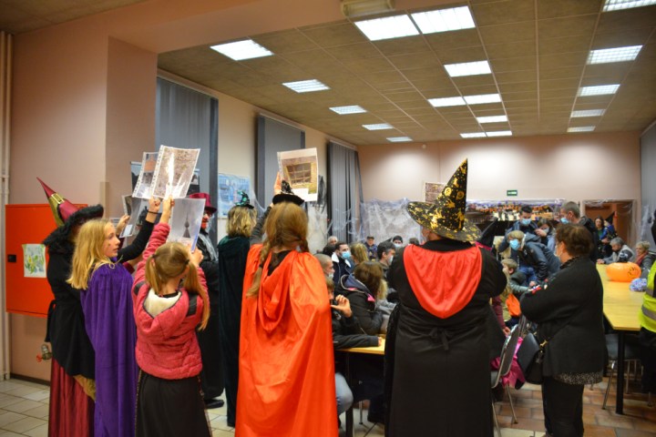 a group of people standing in a room