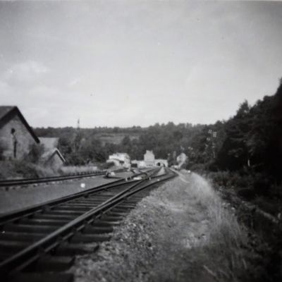 a vintage photo of a train on a steel track