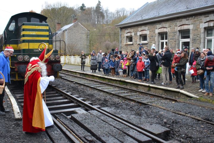a group of people on a train track