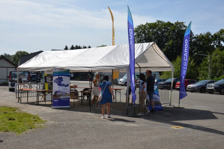 a group of people standing in front of a building