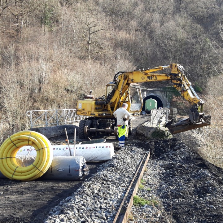 a tractor on a dirt track