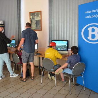 a group of people standing in a room