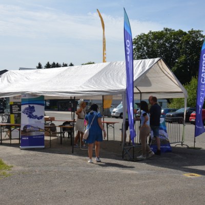 a group of people standing in front of a building