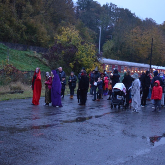 a group of people walking in the snow