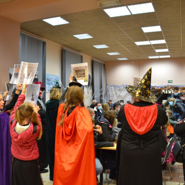 a group of people standing in a room