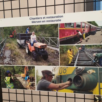 a group of people standing in front of a building