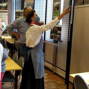 a group of people standing in a room