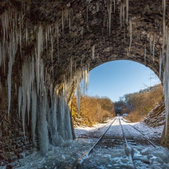 a snow covered bridge