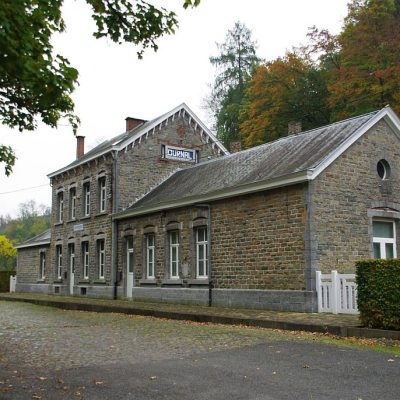 a house on the side of a road