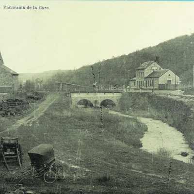 a vintage photo of a hillside next to a house