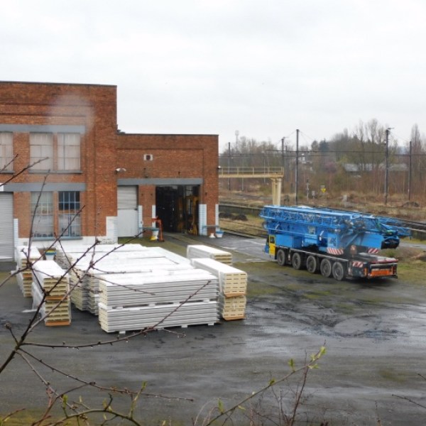 a truck is parked on the side of a building