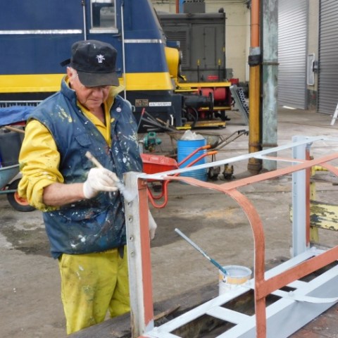 a man standing on a cart