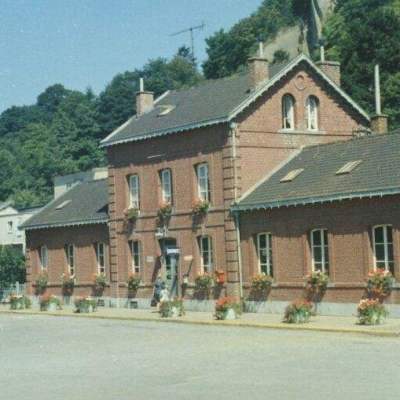a house with trees in the background