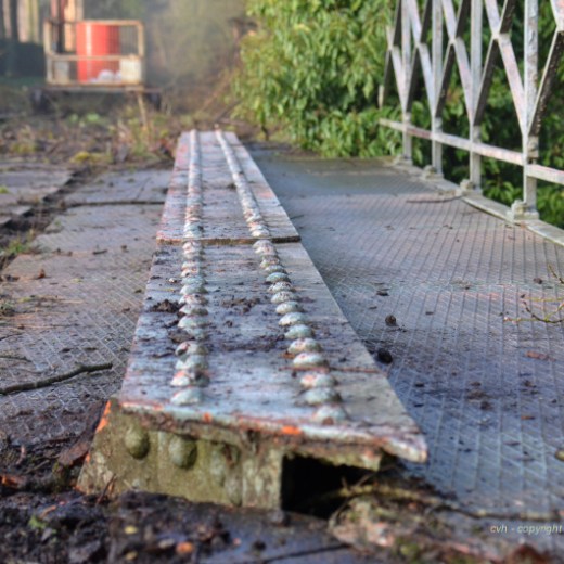 a river running through a fence