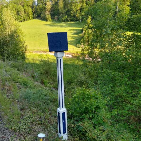 a sign on the side of the road