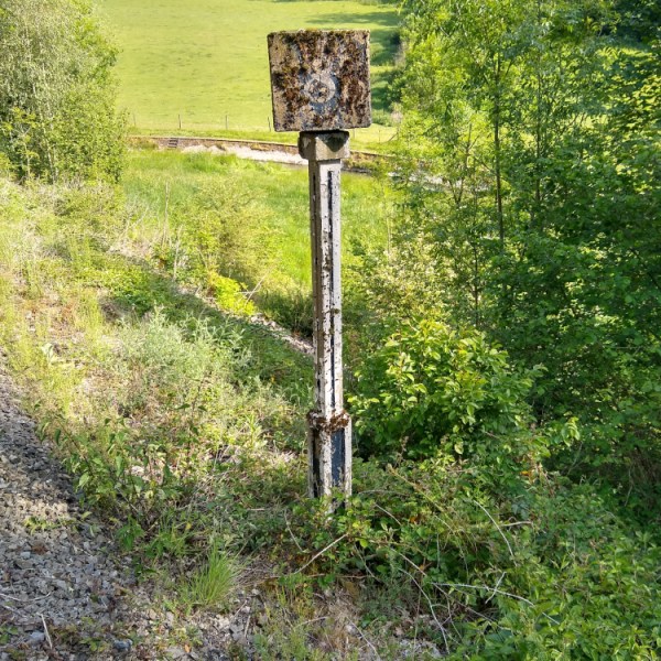 a sign on the side of the road