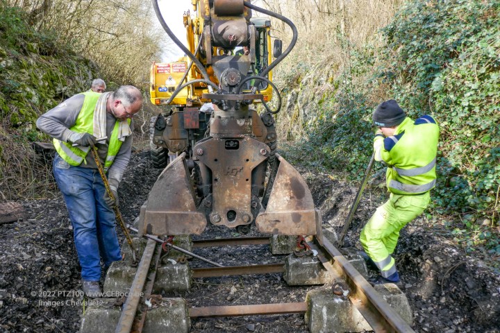 a couple of people that are standing in the dirt