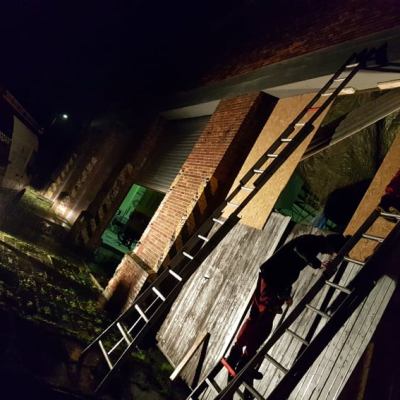 a row of wooden benches sitting on top of a bench