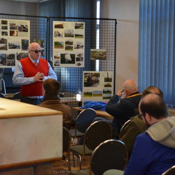 a group of people sitting at a table