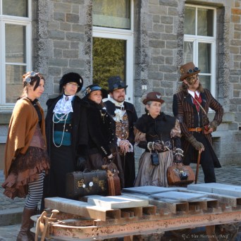 a group of people standing in front of a building