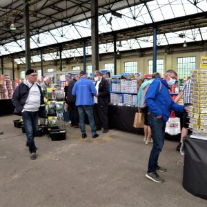 a group of people standing in front of a building