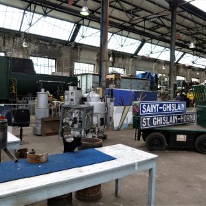 a truck is parked on the side of a building