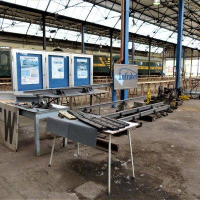 a building with a metal bench