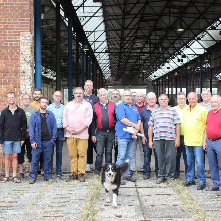a group of people standing in front of a building