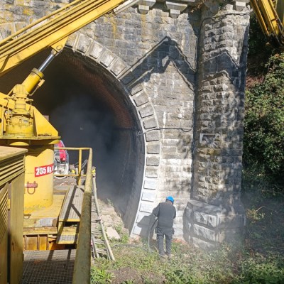a person standing in front of a building