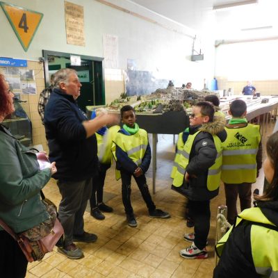 a group of people standing in front of a crowd