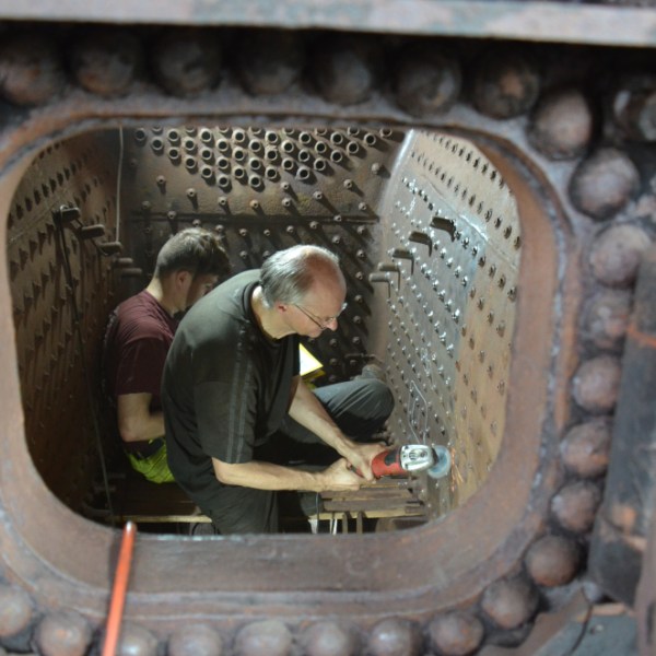 a man riding a skateboard up the side of a ramp