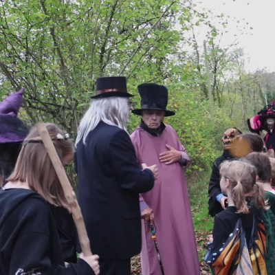 a group of people standing in front of a crowd