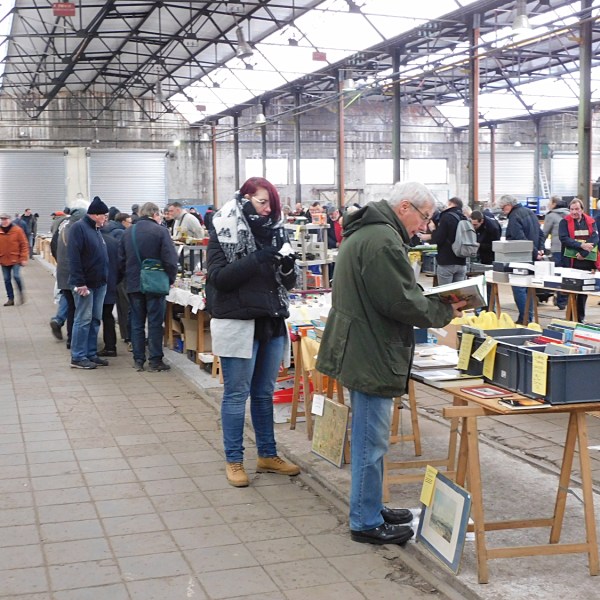a group of people standing in a room