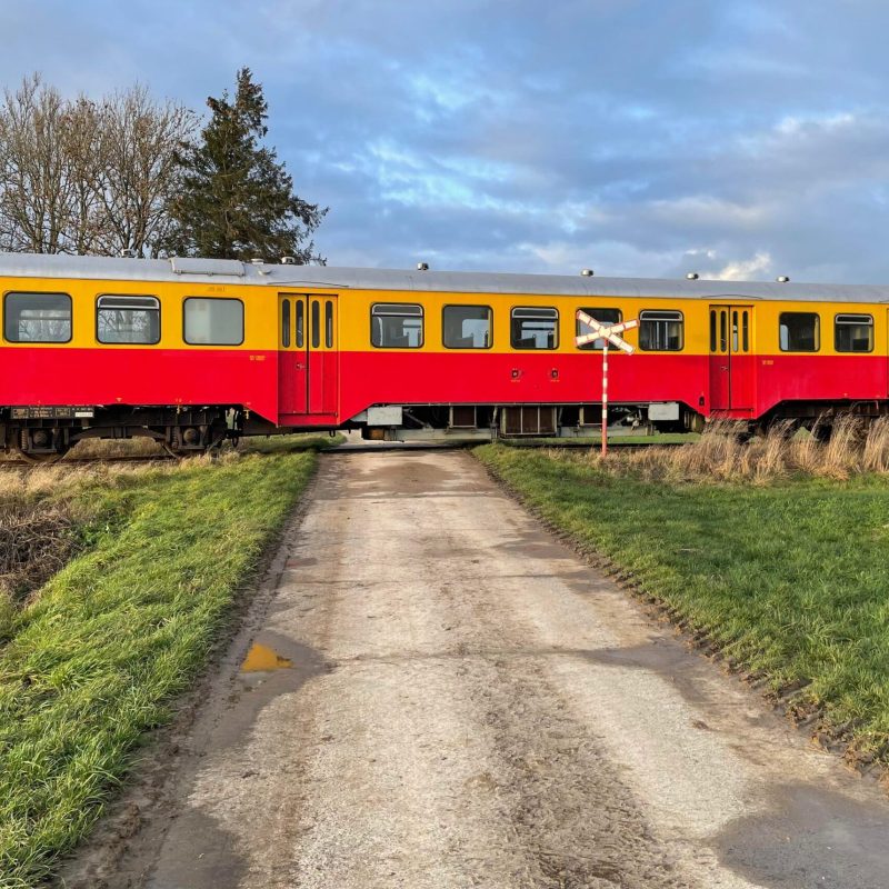 a school bus that is sitting on a train track