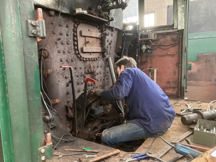 a man standing in front of a building
