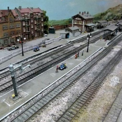 a train is parked on the side of a road