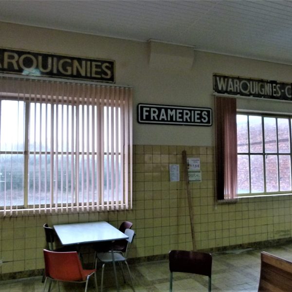 a room filled with furniture and a large window