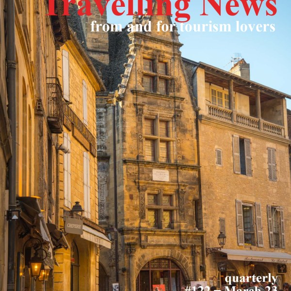 a group of people walking in front of a building