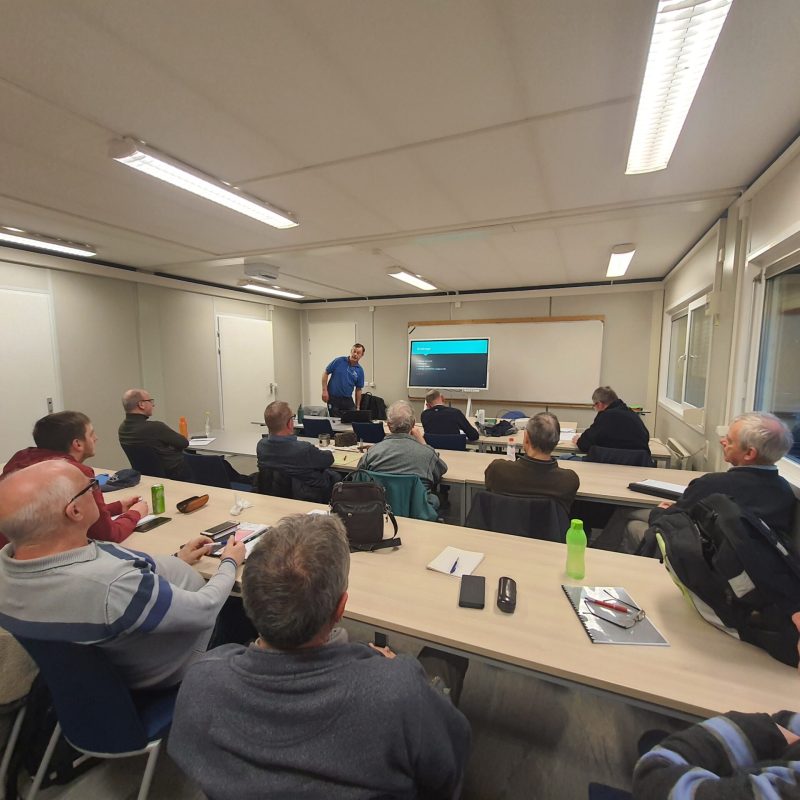 a group of people in a room