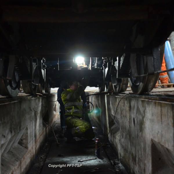 a man riding a skateboard up the side of a building
