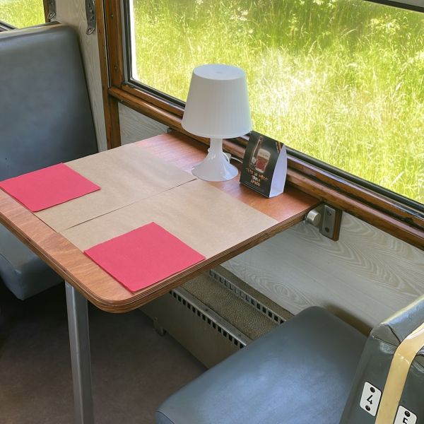 a laptop computer sitting on top of a chair