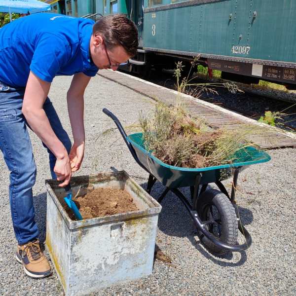 a man riding on the back of a bicycle