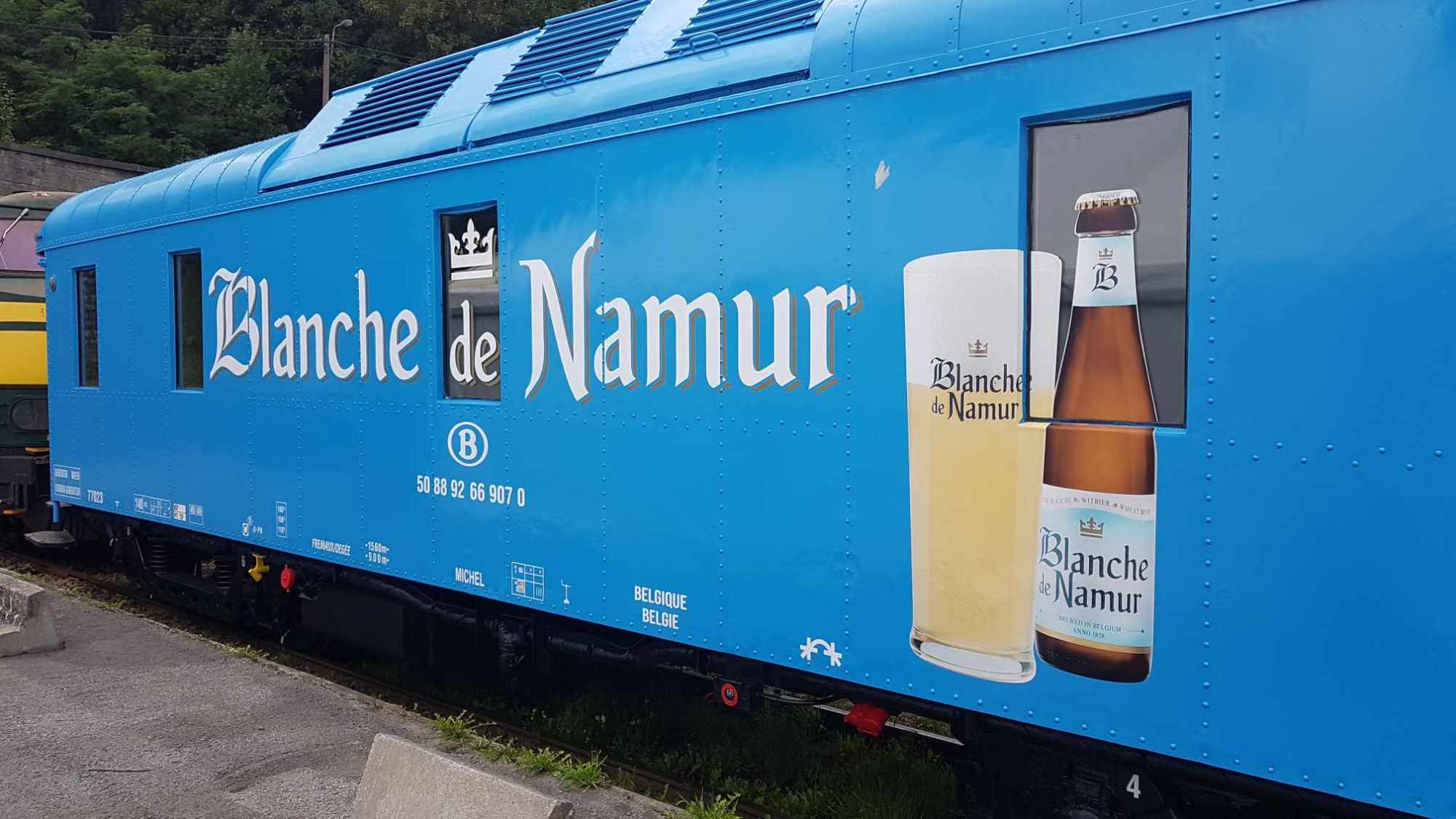 a train that is painted blue