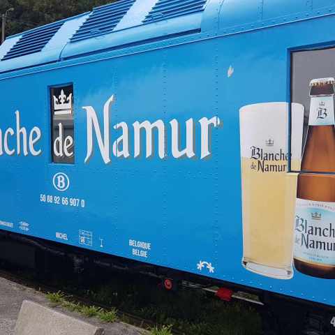 a train that is painted blue