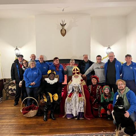 a group of people standing in a room