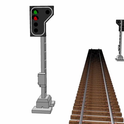 Train tracks with two signal lights, green light visible on the closer signal.