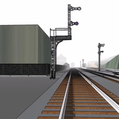 Illustration of railway tracks with signals and a large building on the left.